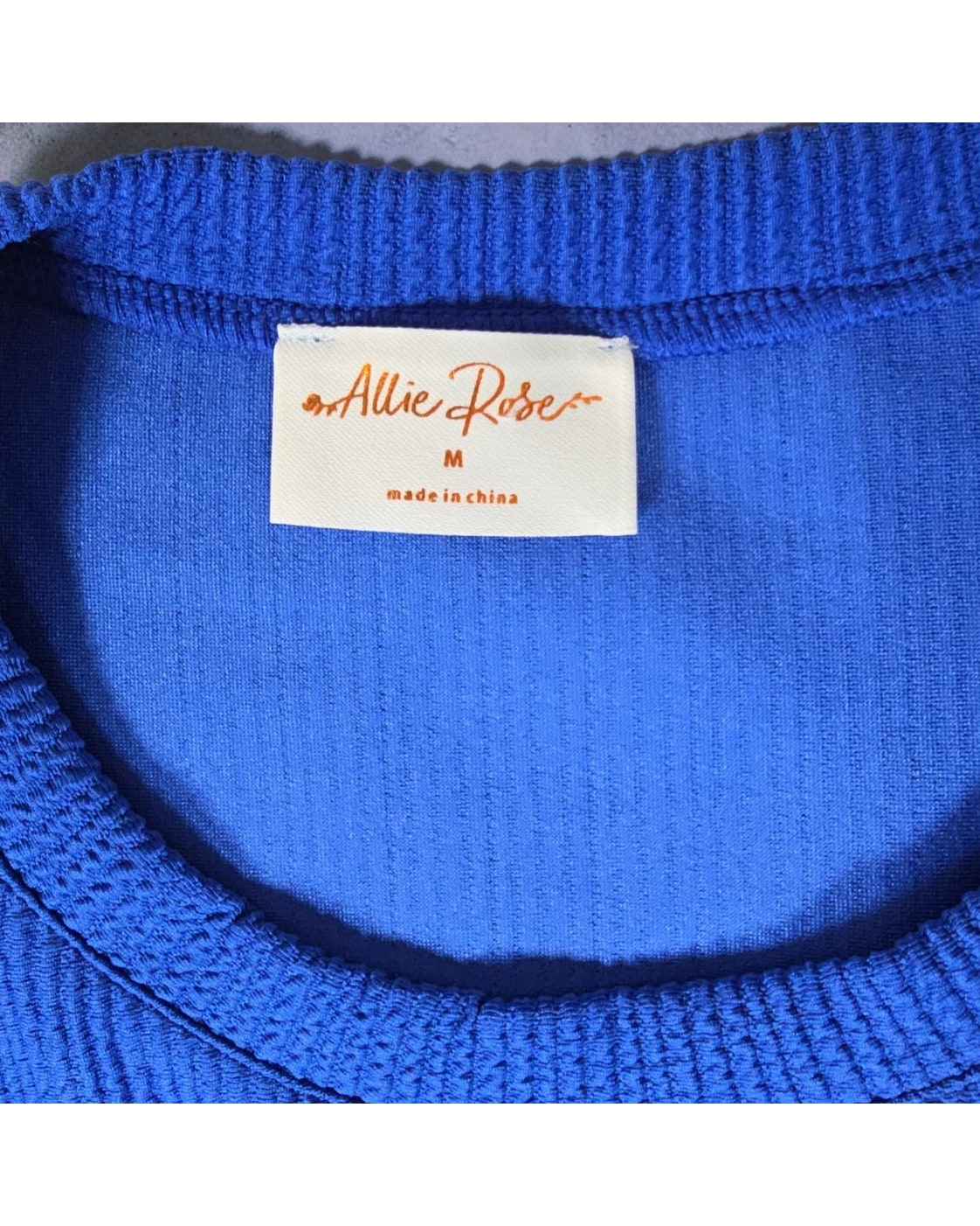 Allie Rose Ribbed Side-Slit Short Sleeve Knit Top